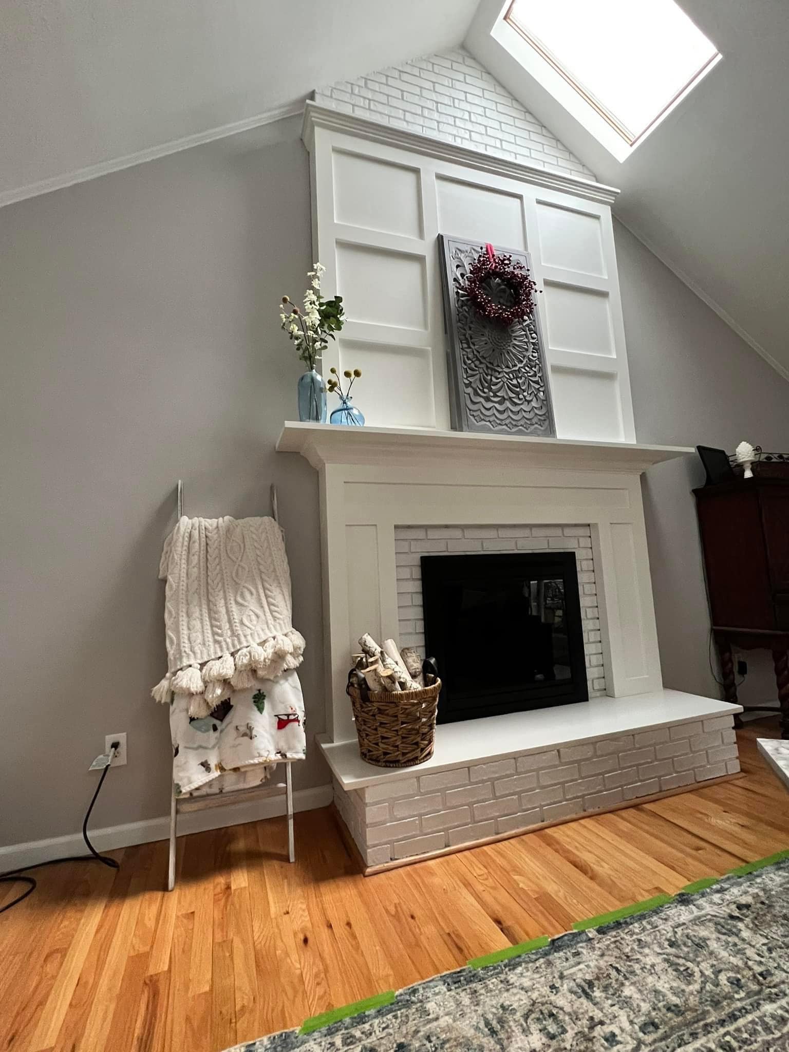 Beautiful custom fireplace installation with white brick and built-in shelving