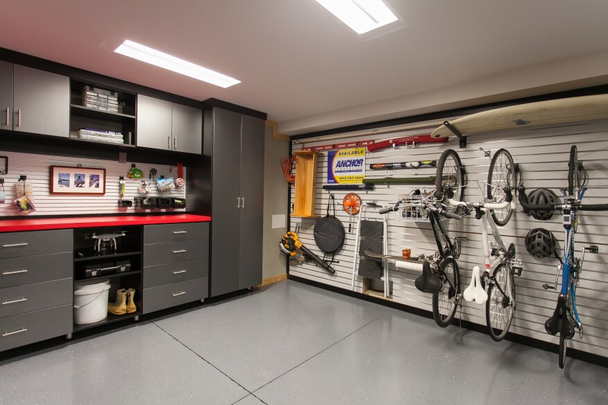 Custom garage storage system with wall organization and tool management