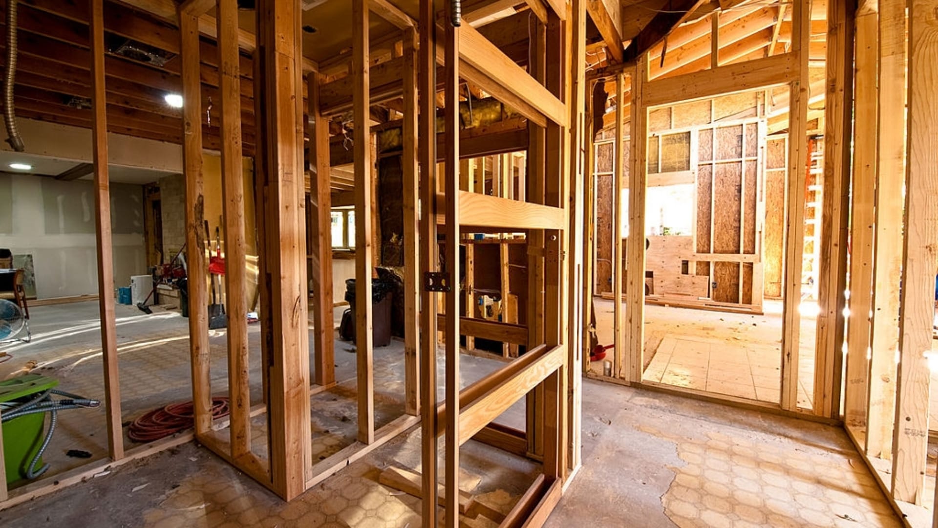 Professional home construction showing wooden framing and structural work